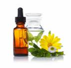 Herbal medicine dropper bottle with herbs and flowers
